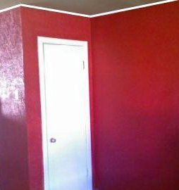 Barn Red paint color with a texture