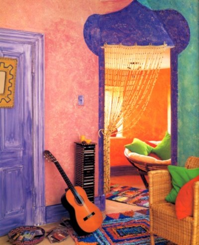 Flamboyant sponged off finish in a teen's bedroom, done in a Caribbean color scheme