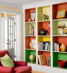 Bookcases can be transformed with a pop of color on the back