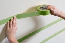 Tape the outside edges of the stripes you'll paint